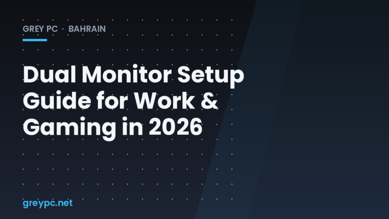 Dual monitor desk setup with gaming PC in a Bahrain home office