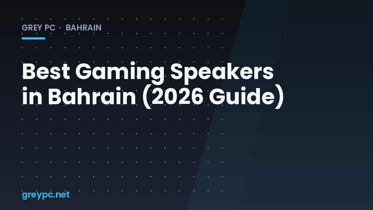 Compact 2.1 gaming speaker set with subwoofer on a desk next to a gaming PC monitor